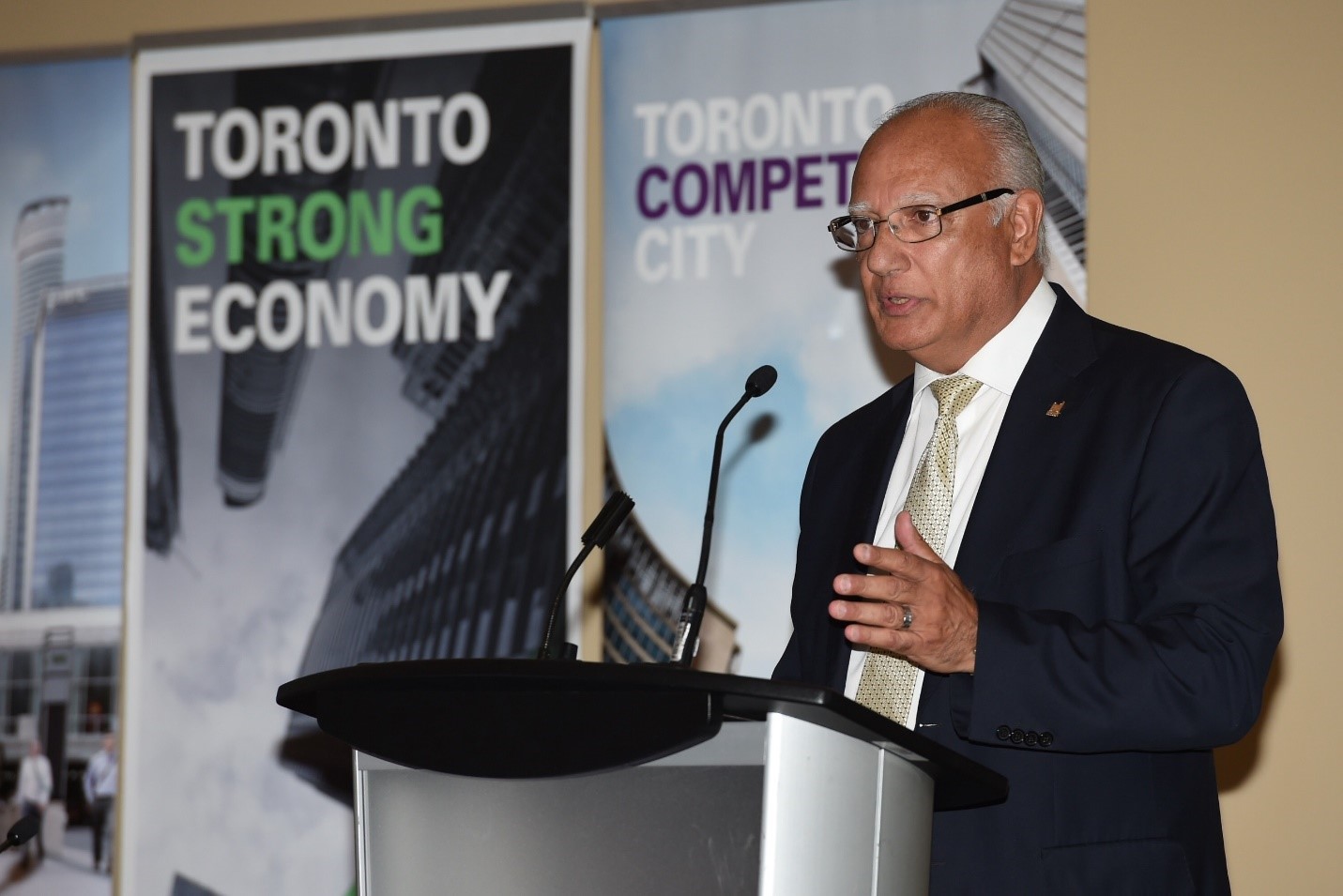 Councillor Vincent Crisanti speaking at a podium